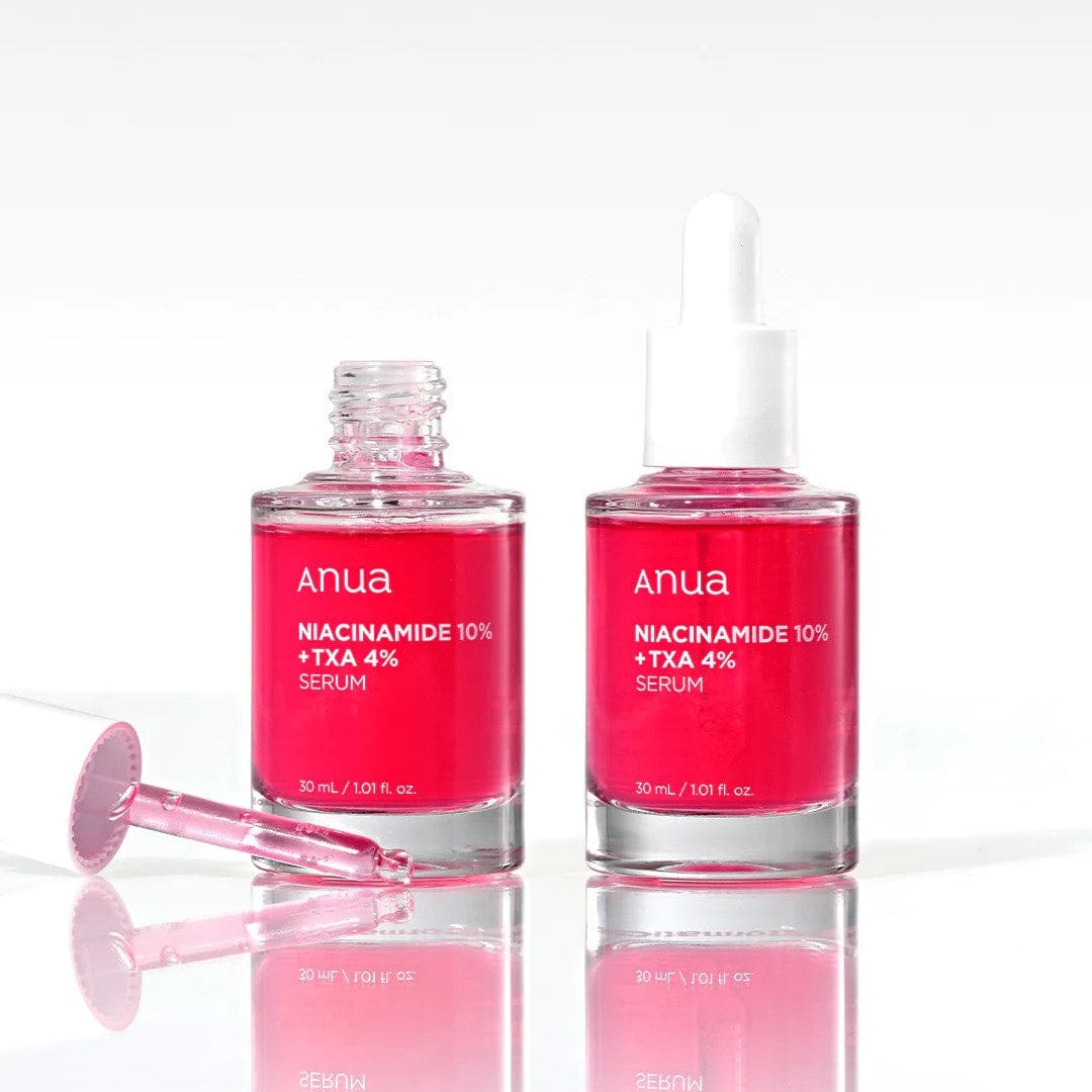Anua Dark Spot Removing Serum with Niacinamide 10% and TXA 4% in 30ml bottles for brighter, smoother skin.
