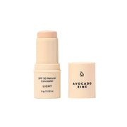 Avocado Zinc SPF 50 Natural Concealer in light shade provides mineral coverage with broad-spectrum protection.