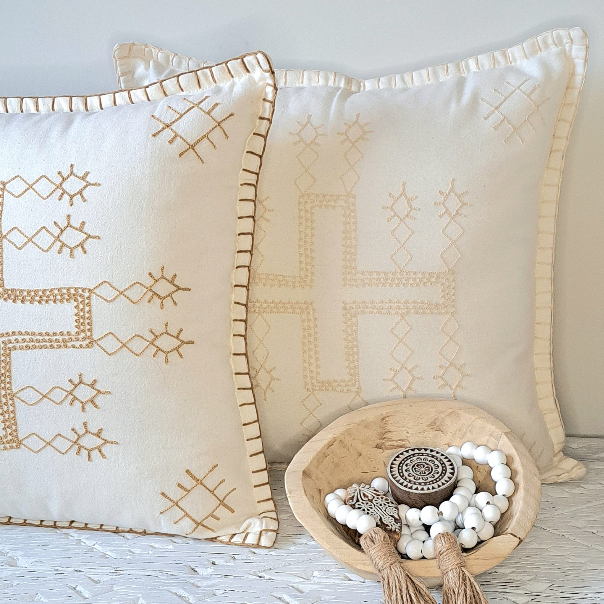 Boho Cross Cushion Natural showcasing neutral tones and intricate stitched patterns for home decor.