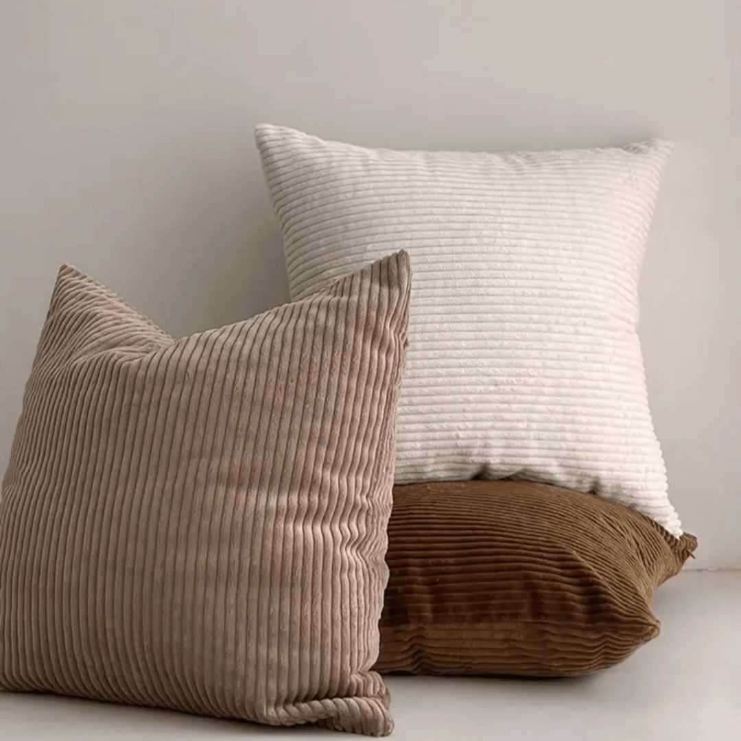 Corduroy Cushion Cover Latte displayed on cozy pillows, featuring soft textures and warm colors for home decor.