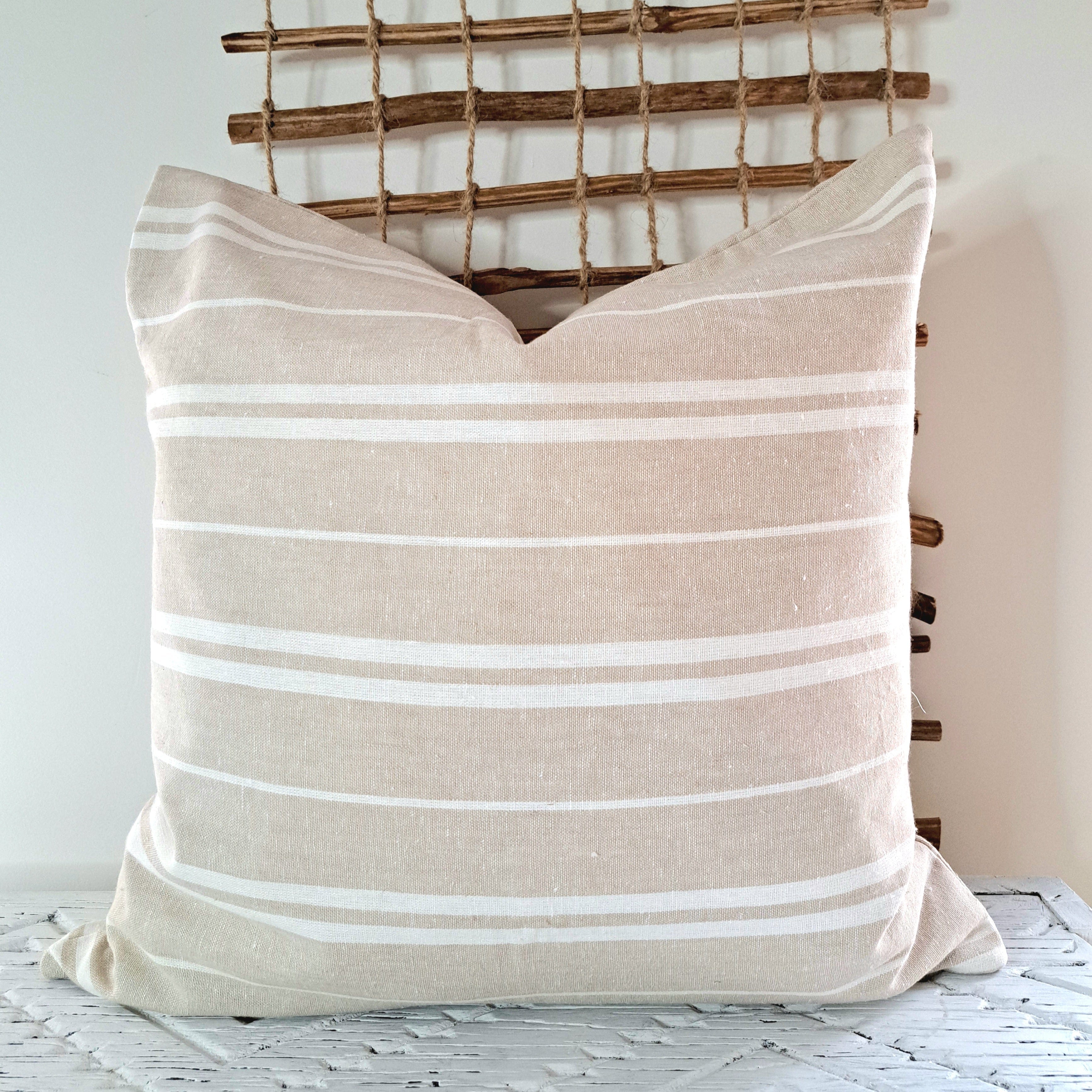 Oatmeal Stripe Linen Cushion Cover with a natural texture and subtle white stripes, ideal for home decor.