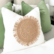 Solara Sun Cushion Disk featuring a caramel boho design, adding warmth and texture to home decor.