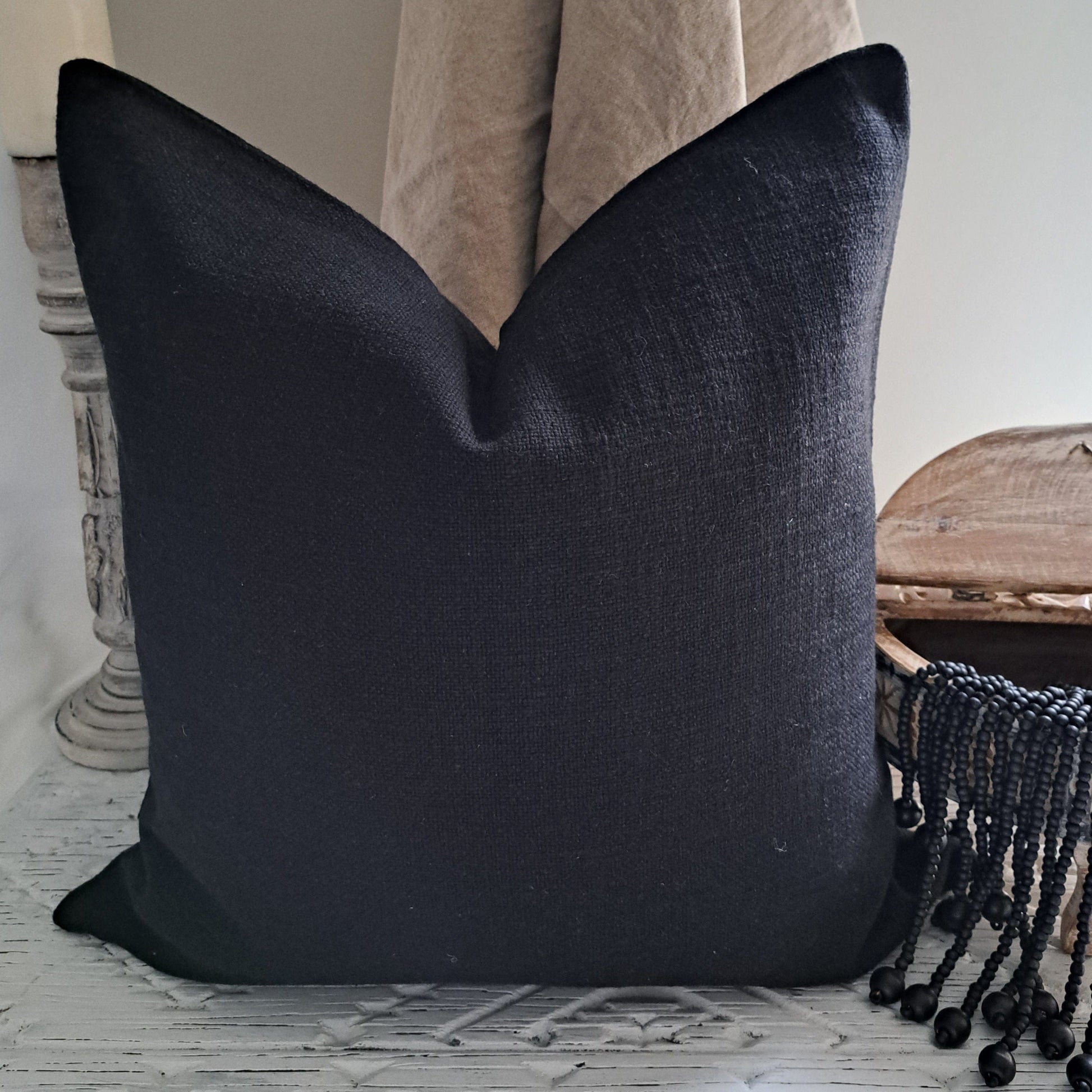Base Cushion Black cotton textured home decor accent pillow with elegant design and rich finish.
