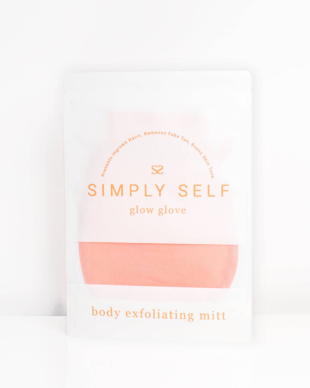 Simply Self Glow Essential Body Bundle body exfoliating mitt packaging with peach color, designed to cleanse and nourish skin