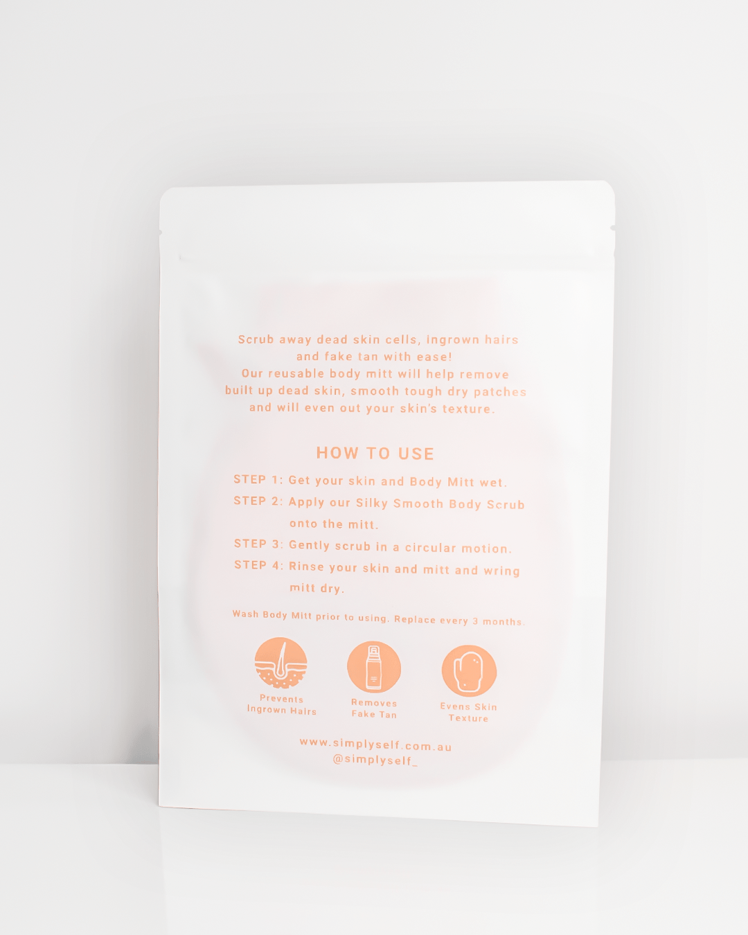 Simply Self Glow Glove Body Mitt packaging with usage instructions and benefits for exfoliating and improving skin texture.