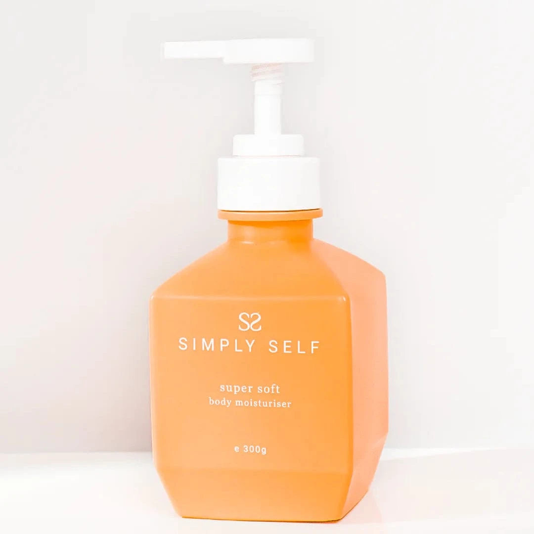 Simply Self Super Soft Body Moisturiser 300g in orange bottle for deep hydration and skin comfort.