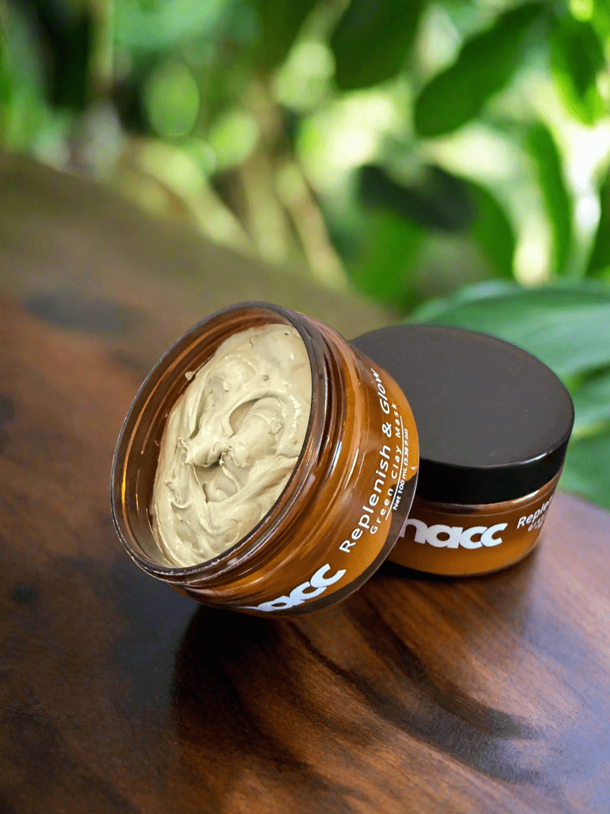 SNACC Beauty Replenish & Glow Green Clay Face Mask on a wooden surface