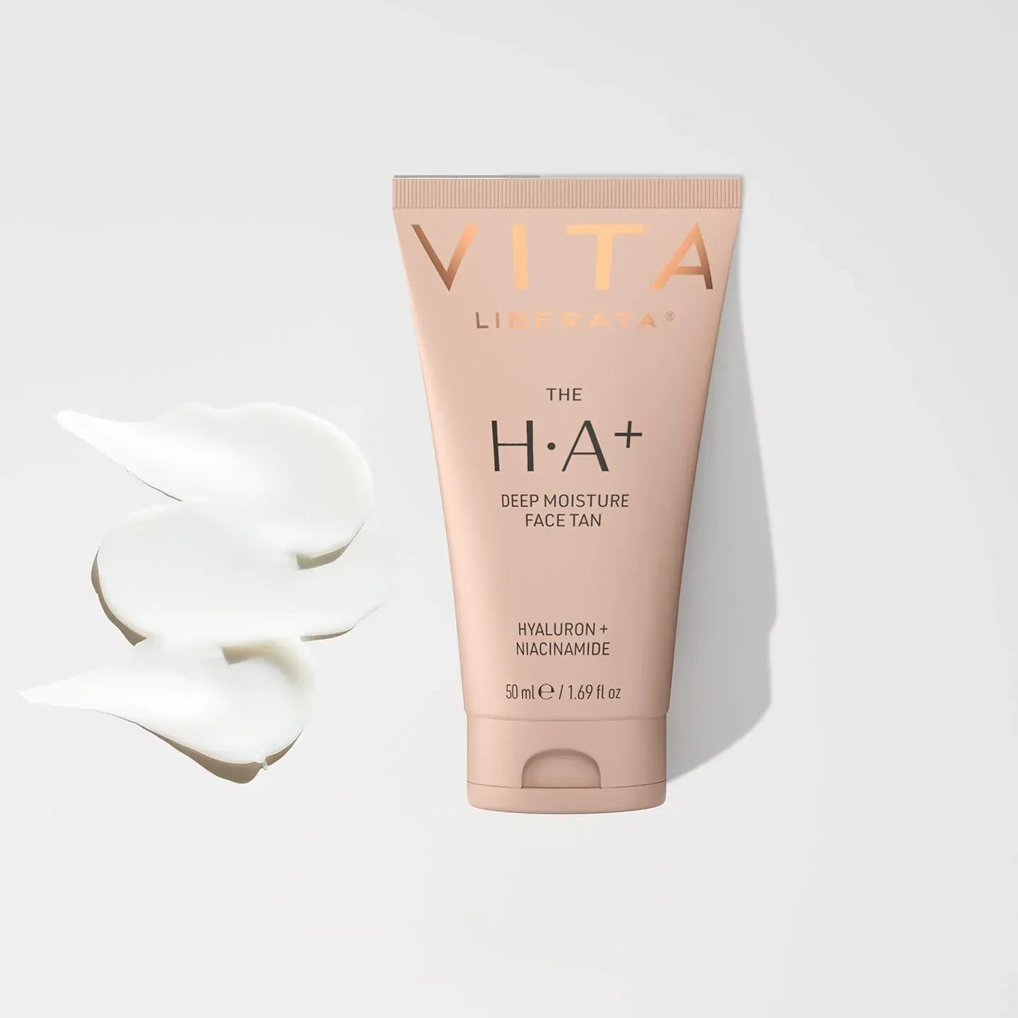 Vita Liberata HA + Deep Moisture face tan serum tube with sample swatch, showcasing hydrating glow serum for natural sun-kissed complexion.